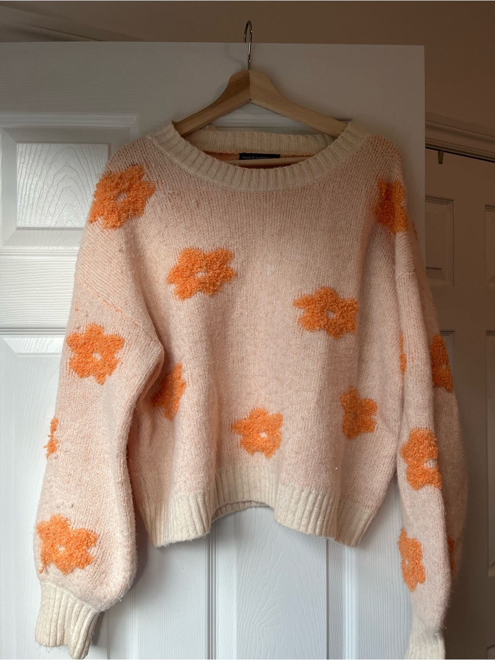 moon & madison Peach Crewneck Sweater with Orange Floral Motif